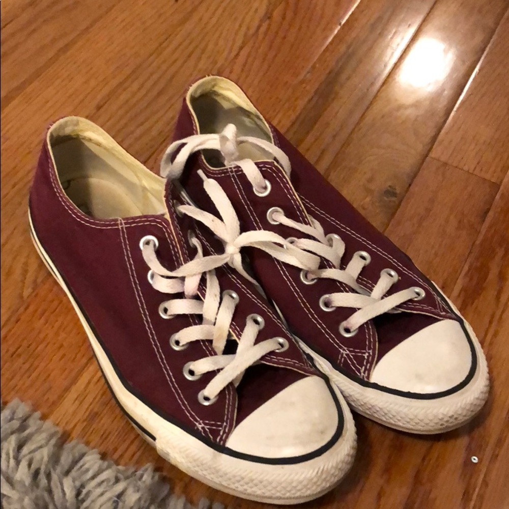 Maroon low-top converse